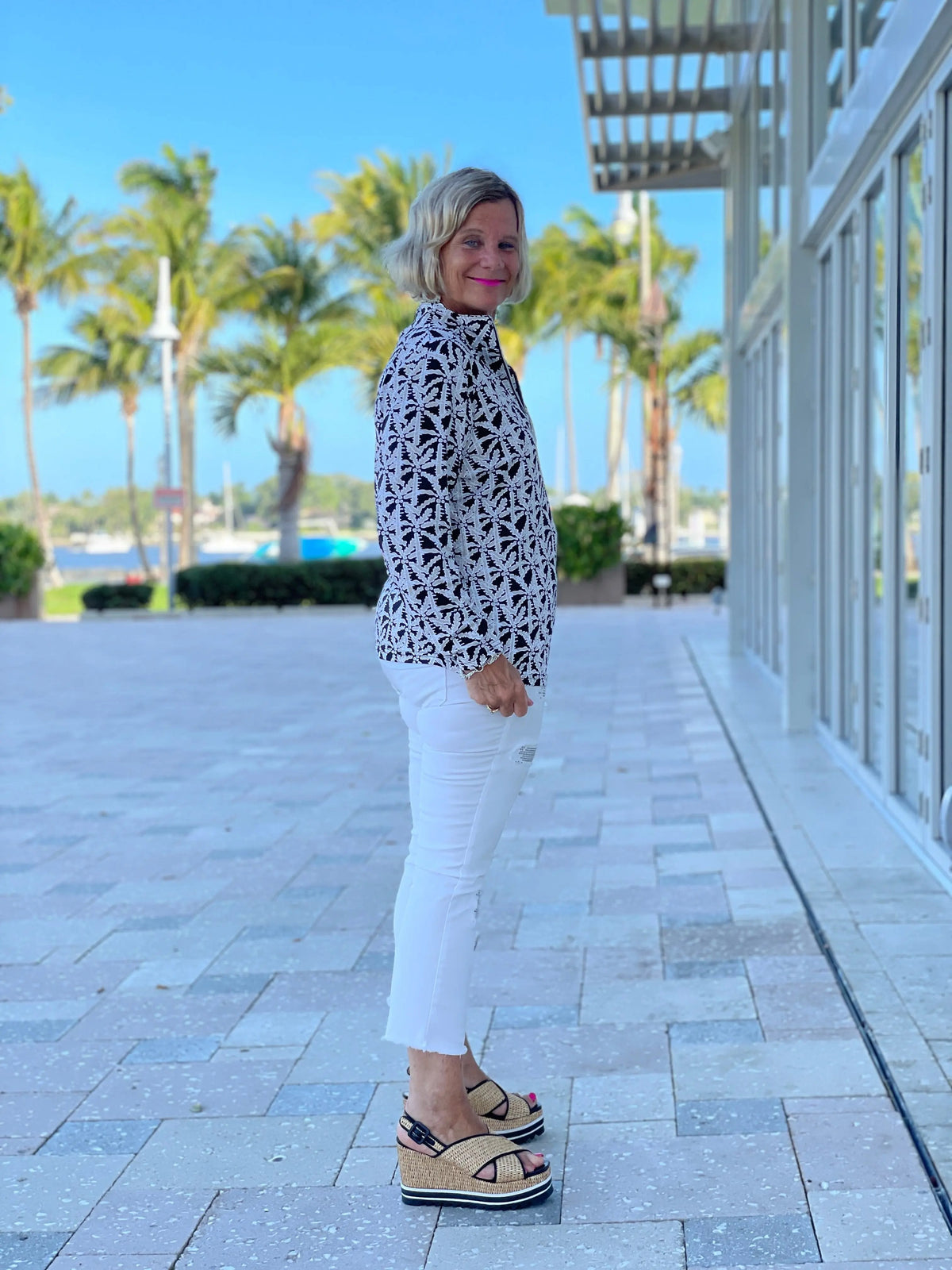 BLACK AND BEIGE PALM ZIPPER TOP