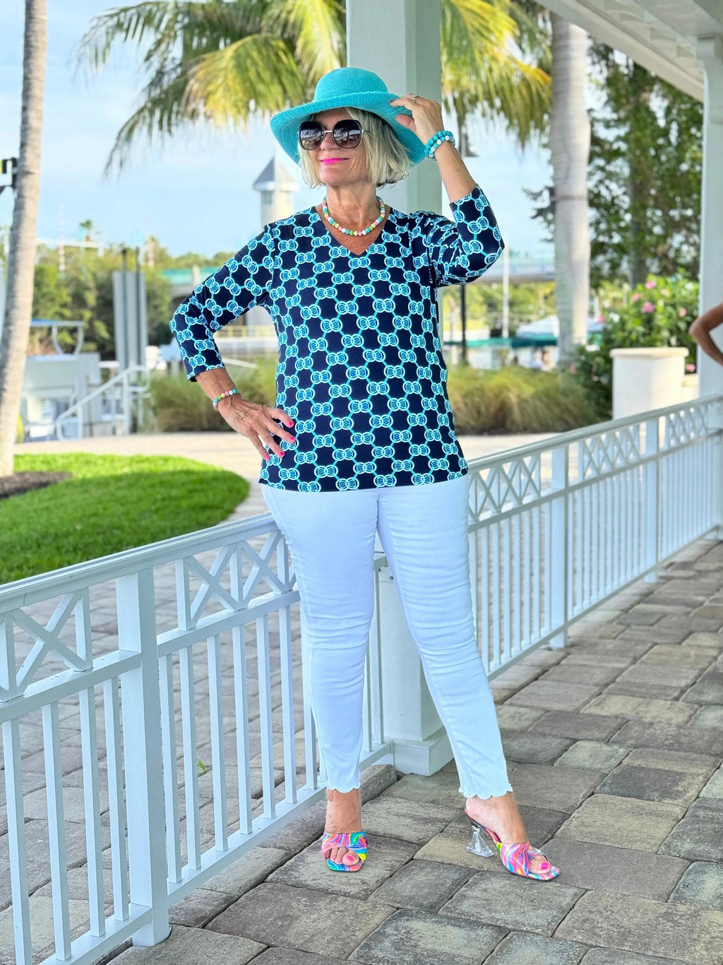BLUE MEDALLION V NECK TOP