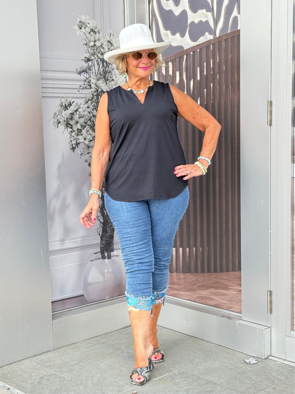 BLACK SLEEVELESS V-NECK