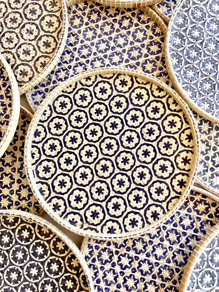 light tan woven tray with navy blue mosaic flower pattern 12 inches detail view