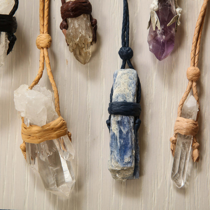 Handmade quartz & leather pendants
