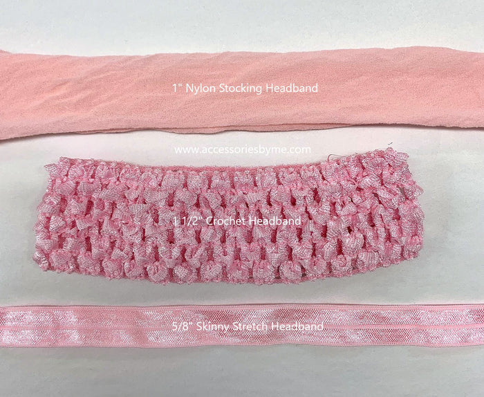 Three pink headbands of different widths displayed on a white background.