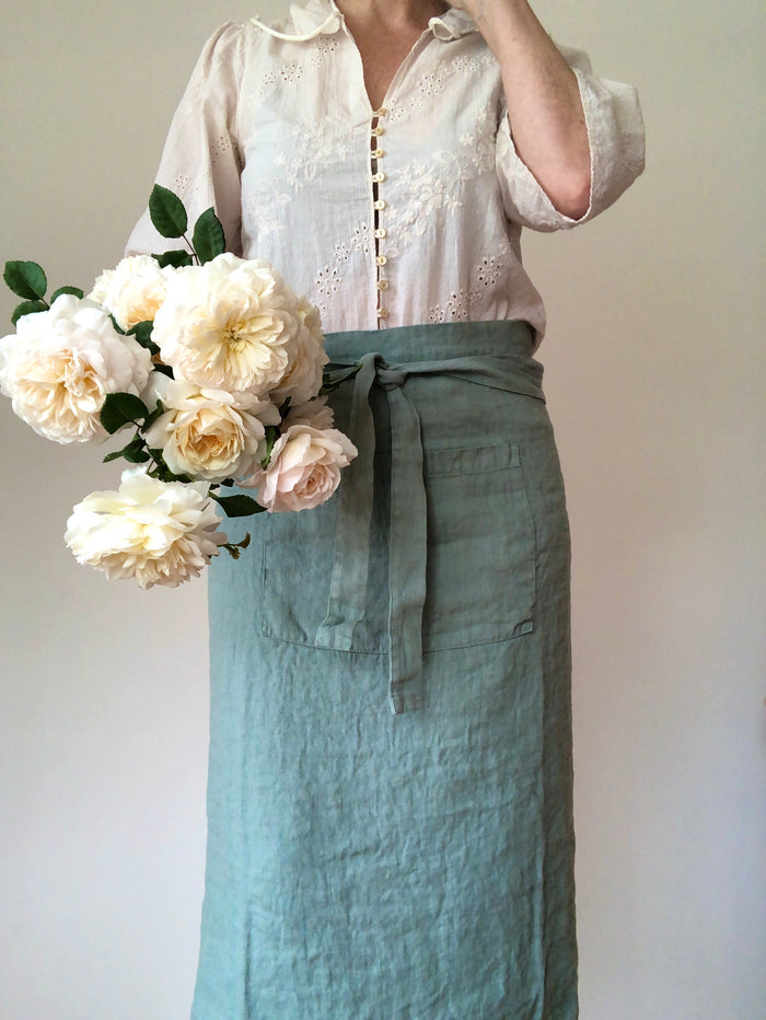 sage green linen apron bistro style