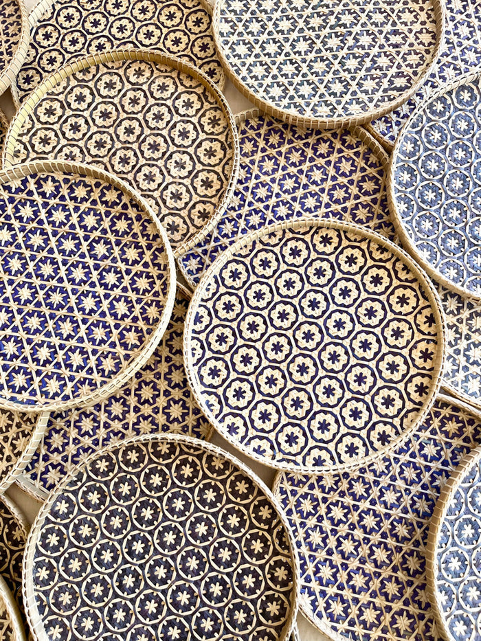 light tan woven tray with navy blue mosaic star pattern 12 inches with other patterns